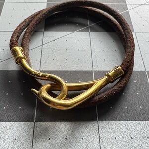 HERMES pre owned Jumbo double bangle brown Bracelet with a gold plated hook. 57